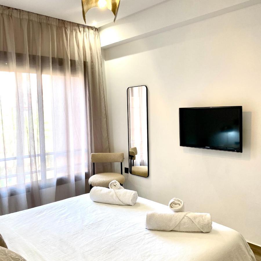 Rooftop Pool, Bright & Cozy Apartment In City Center Marrakesh Bagian luar foto